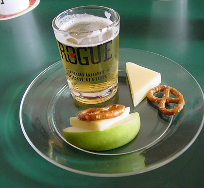 An apple pretzel cheese sandwich