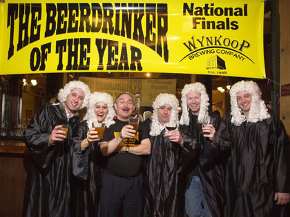 Warren Monteiro, Beerdrinker of the Year, with judges at Wynkoop Brewing